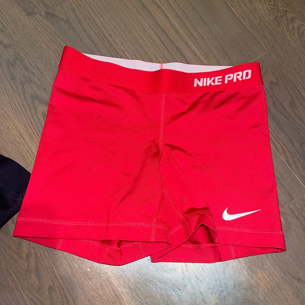 Red Nike pro shorts worn twice
